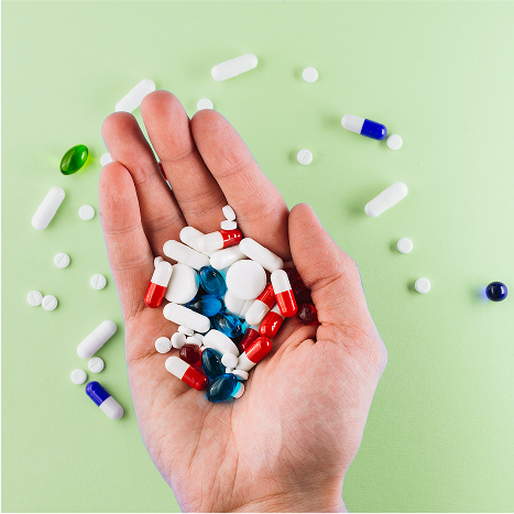 Hand holding medicines
